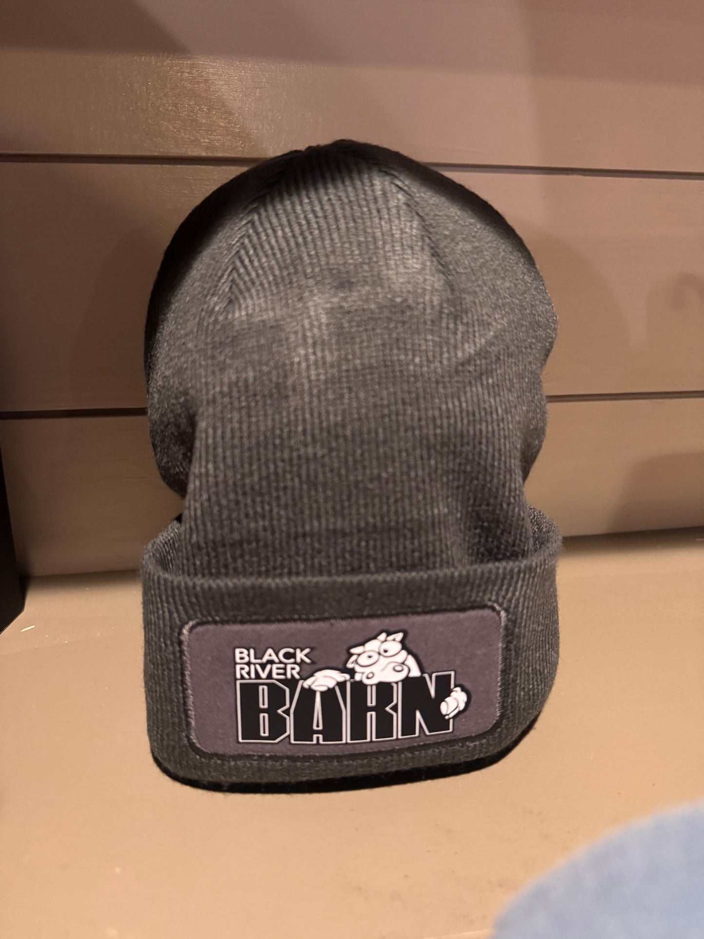 Gray knit Black River Barn beanie with logo patch on front